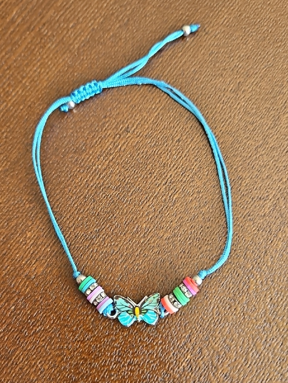 Turquoise Cord Bracelet with Butterfly Charm